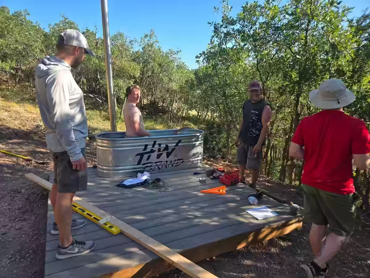 Installing the first cowboy tub on the freshly built deck