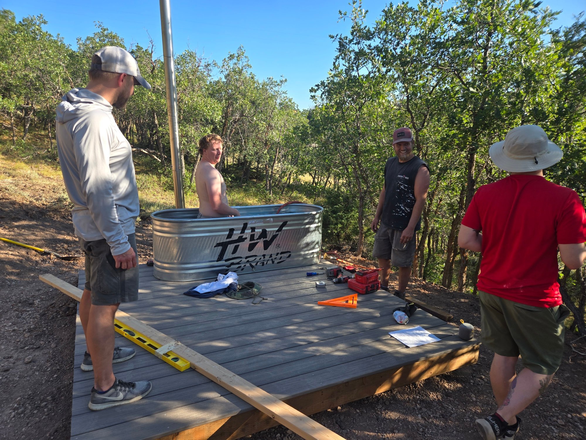 Installing the first cowboy tub on the freshly built deck