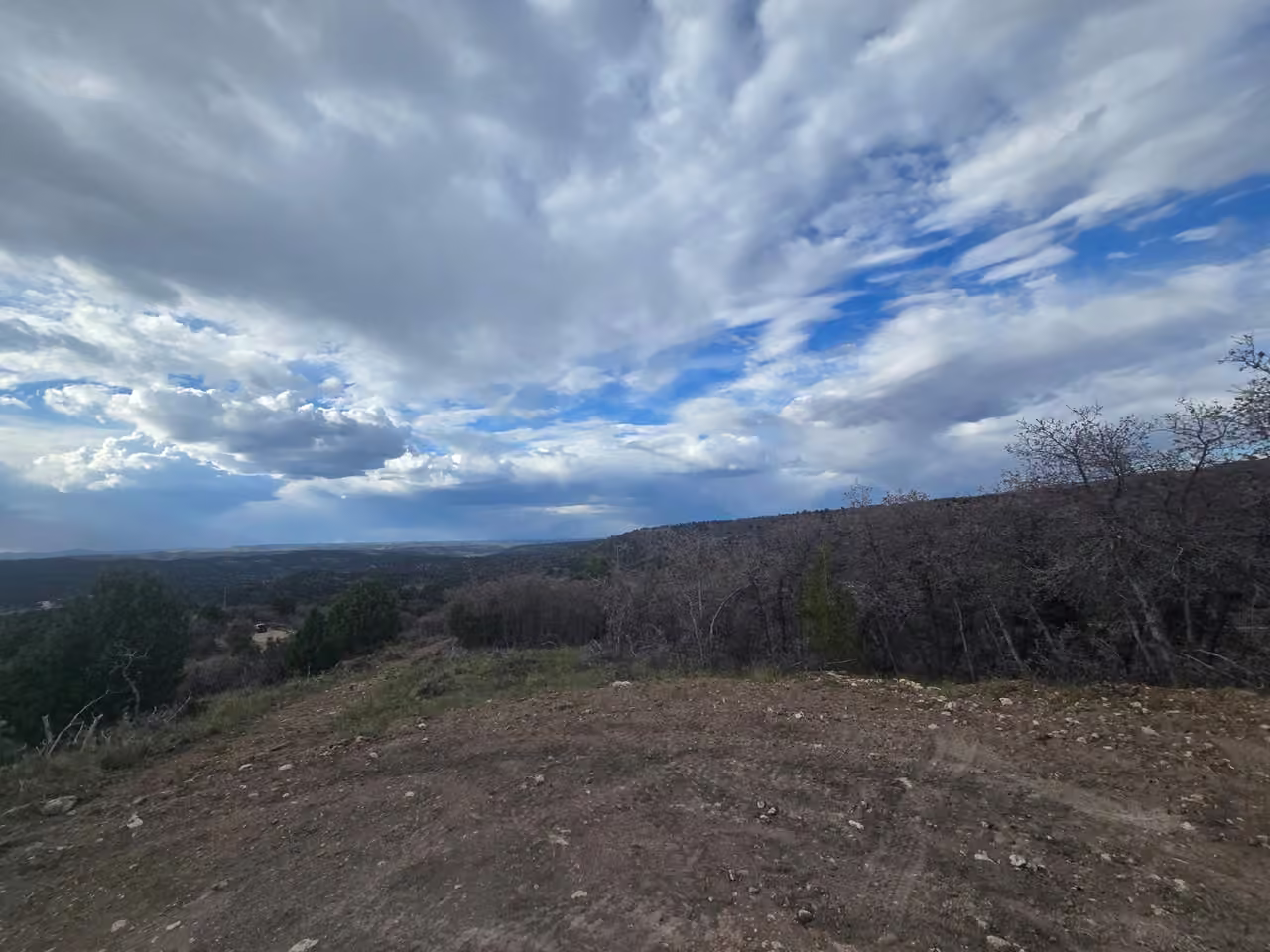 Storm clouds over the valley from East Ridge at Starlit Ridge