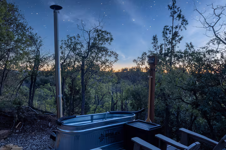 Sunrise Hollow wood fired soaking tub dark sky night — Starlit Ridge Utah